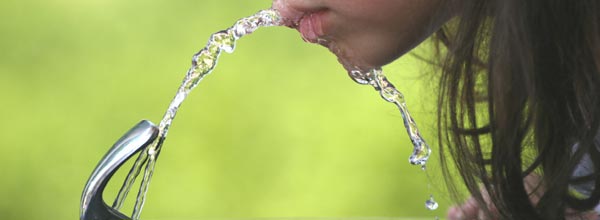 girldrinkingfromwaterfountain.jpg